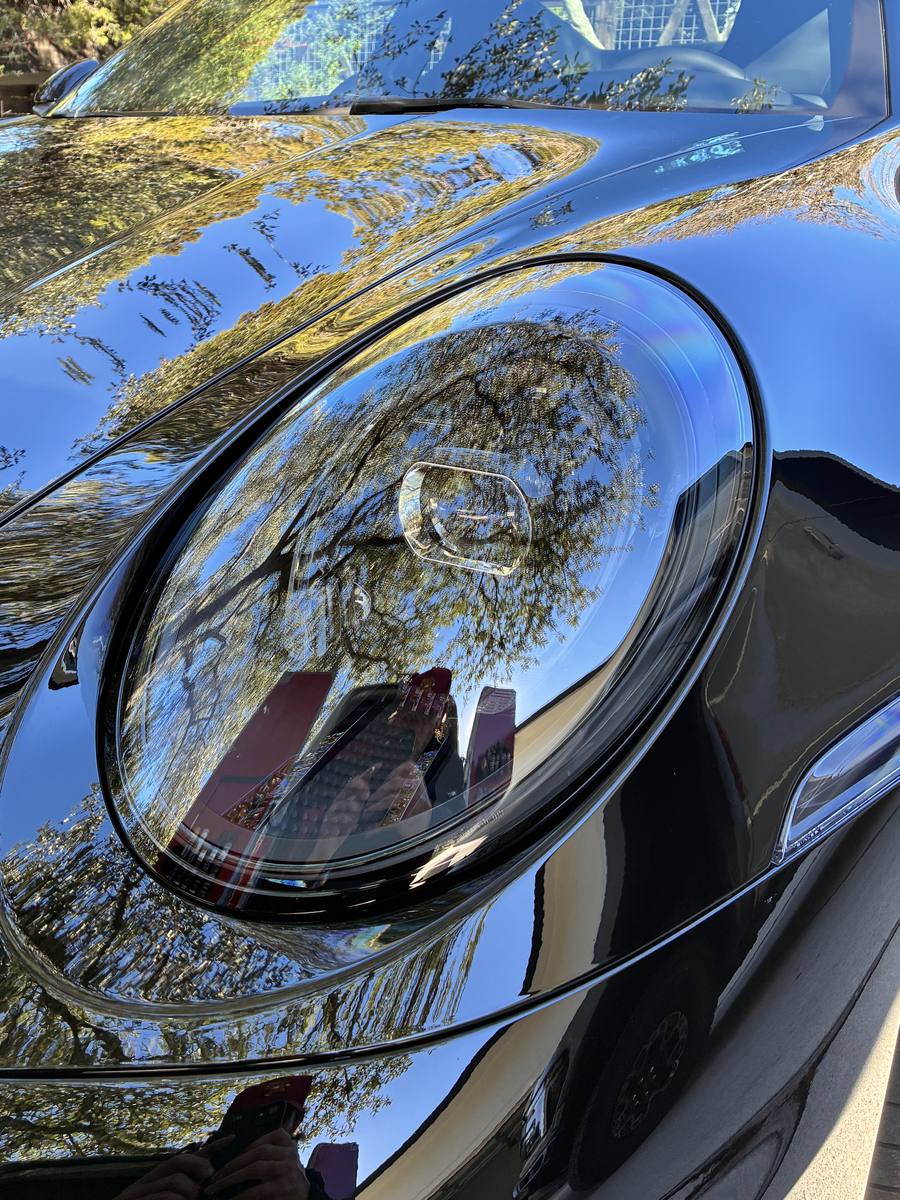 The same Porsche 911 after a Drip-N-Shine spot-free hand wash, paint reflecting clearly
