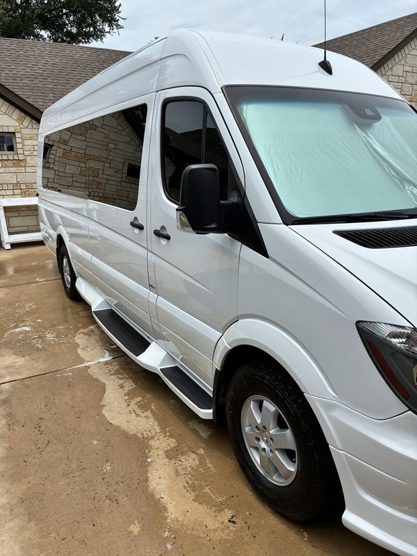 Clean white Mercedes Sprinter van after a Drip-N-Shine on-site hand wash