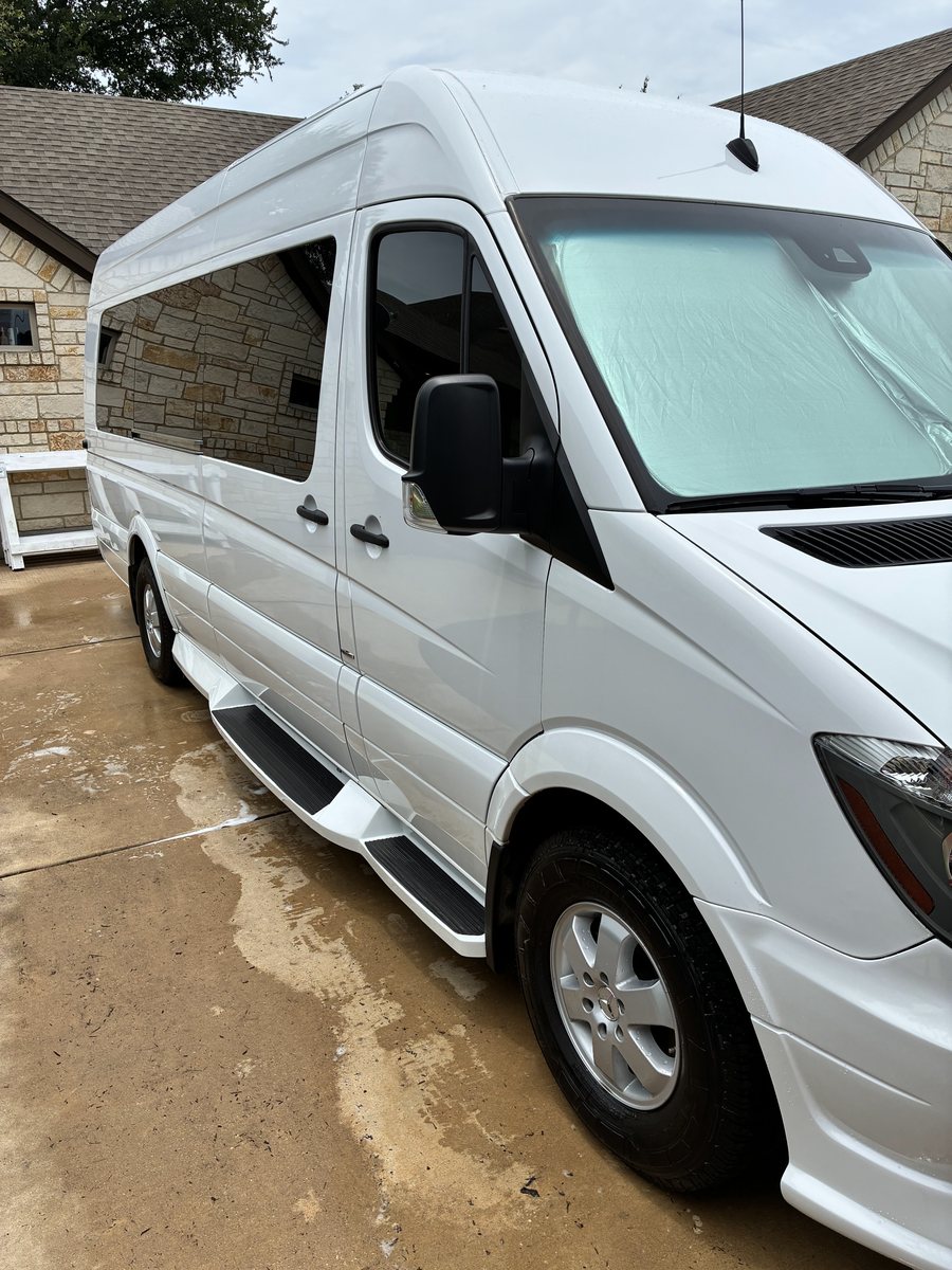 Large white Mercedes Sprinter van washed by hand at the customer’s home